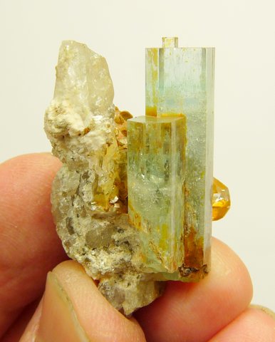 Aquamarine crystals on quartz
