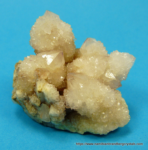 Sparkling, milky cactus quartz crystals on matrix