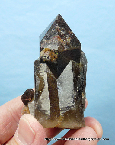 Smoky quartz crystals with hematite