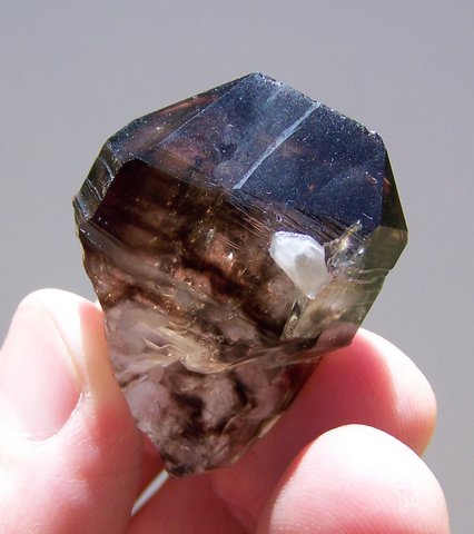 Smoky quartz crystal with large female termination and lovely colouring
