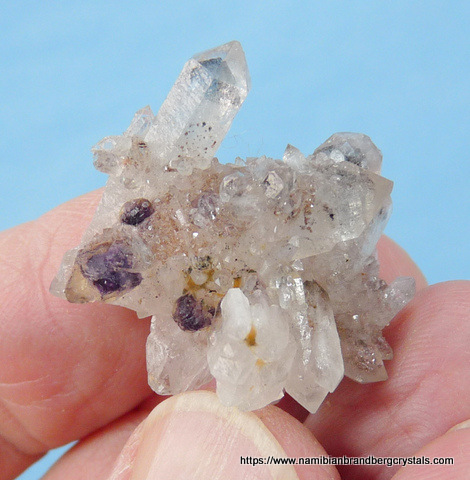 Phantom quartz crystal group with fluorite crystals