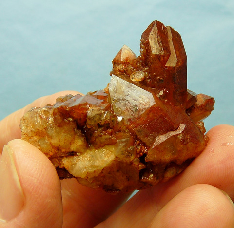 Quartz crystas with orangy-brown hematite colouring captured