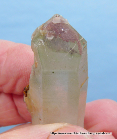 Aquamarine crystal with feldspar