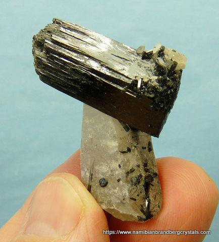 Quartz with schorl crystal attached