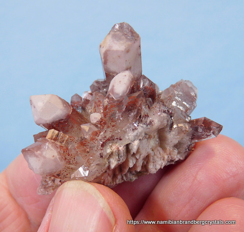 Quartz crystal group with beautiful hematite inclusions