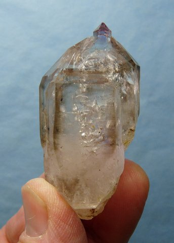 Unusual quartz crystal with semi-sceptre on its termination