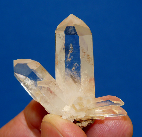 Quartz crystal group with two very small moving bubbles