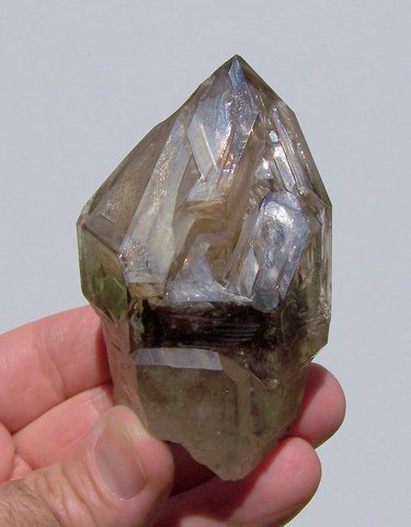 "Venster" quartz crystal with spectacular facets in window