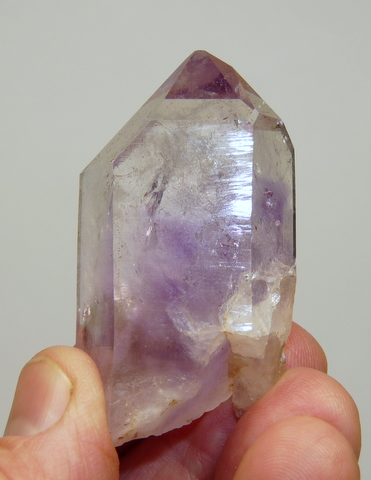 Ouartz crystal with gas and light amethyst colouring