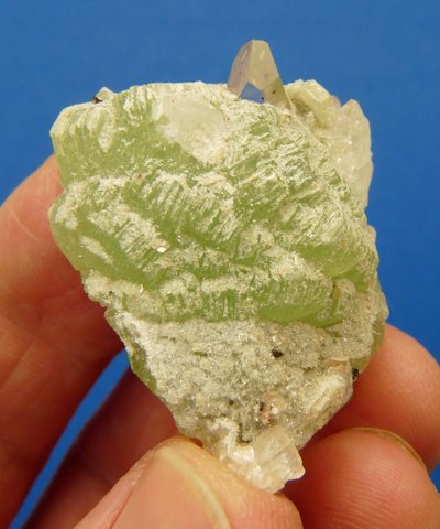Prehnite, calcite and quartz crystals on matrix