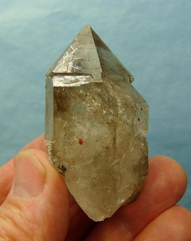 Quartz crystal with unusual facet growth and partially altered to chalcedony