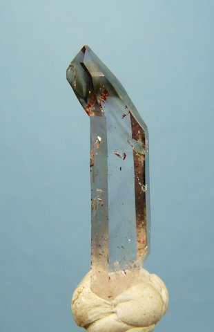 Semi-Sceptre quartz crystal with large termination facet and long stem