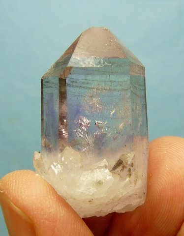 Quartz crystal group with light amethyst colouring