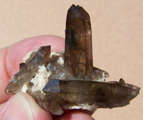 Lovely group of smoky quartz crystals, feldspar and schorl