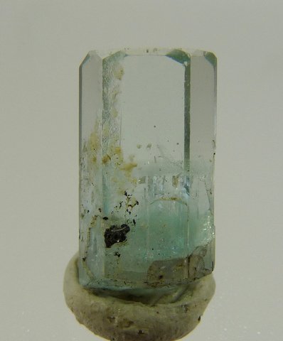 Light blueish aquamarine crystal with gemmy upper