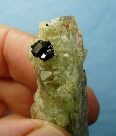 Aquamarine with lovely feldspar inclusions and a small schorl crystal group
