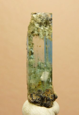 Gemmy aquamarine crystal with inclusions and attachments