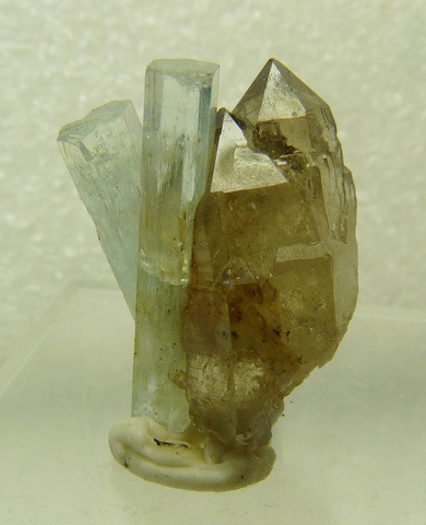 Aquamarine and smoky quartz crystals with bits of schorl