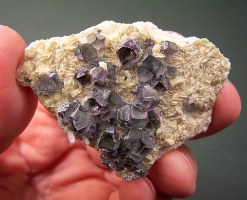 Green and purple fluorite crystals on muscovite - Erongo