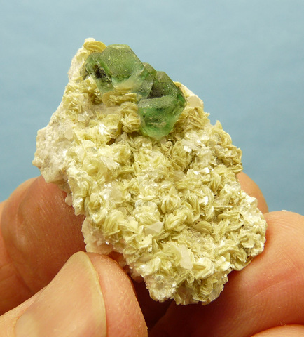 Fluorite and muscovite crystals on matrix