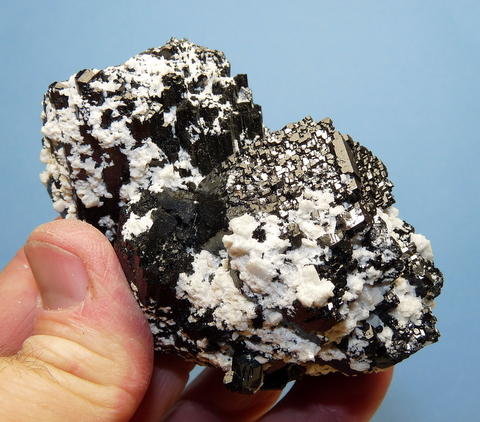 Schorl (variety foitite) crystals with interesting facets.