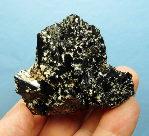 Schorl specimen with lovely facets and feldspar