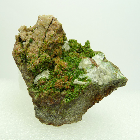Lovely green, small mottramite crystals on rock matrix