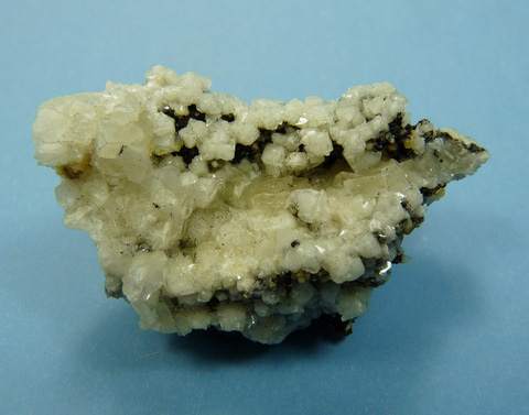Beautiful calcite crystals with high lustre, on manganite matrix