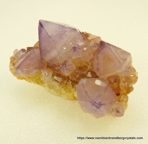 Light amethyst quartz crystals on matrix