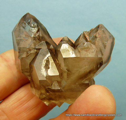 Quartz crystal group with smoky patches