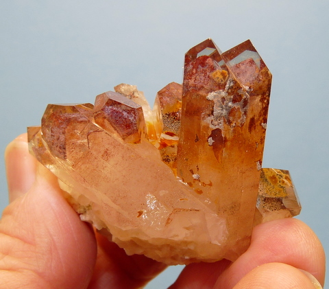 Group of phantom quartz crystals with striking colours