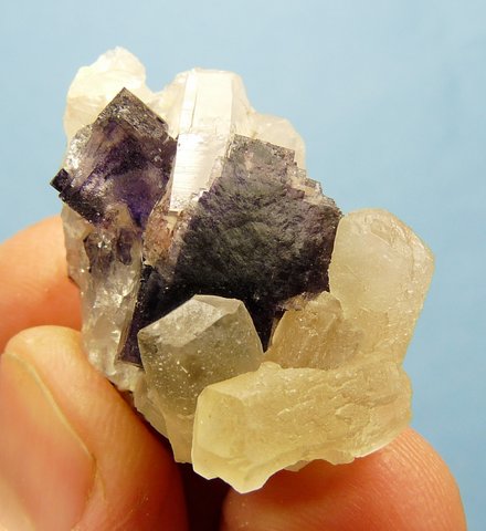 Fluorite and calcite crystals on quartz matrix