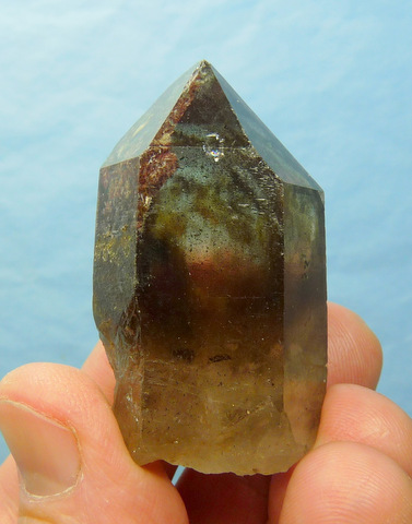 Smoky quartz crystal with a shallow phantom