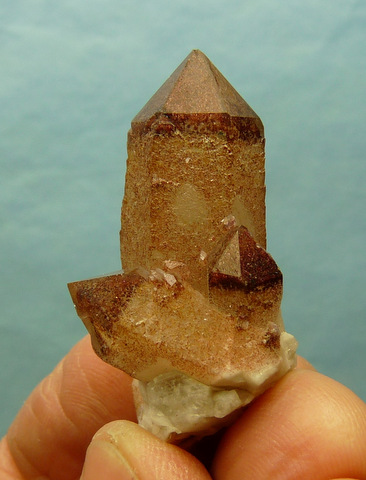 Hematite coloured phantom quartz crystal group