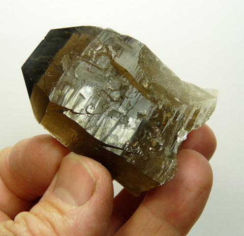Smoky quartz crystal with large female termination and lovely growth patterns