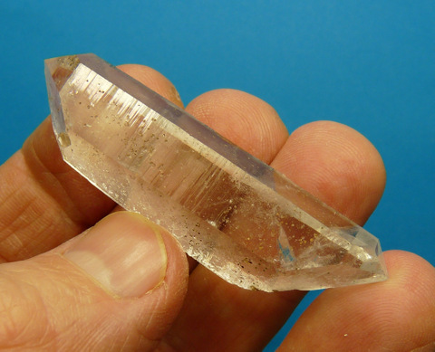 Double terminated, gemmy quartz crystal with inclusions