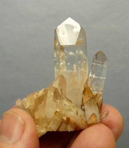 A group of lovely gemmy, clear quartz crystals on matrix