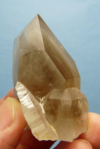 Light smoky phantom quartz crystal specimen