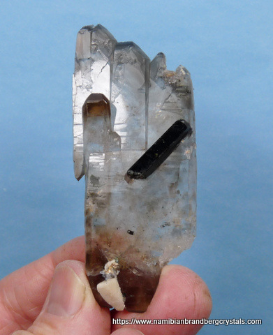 Flattish, double and multi-terminated quartz crystal with smoky colour zones