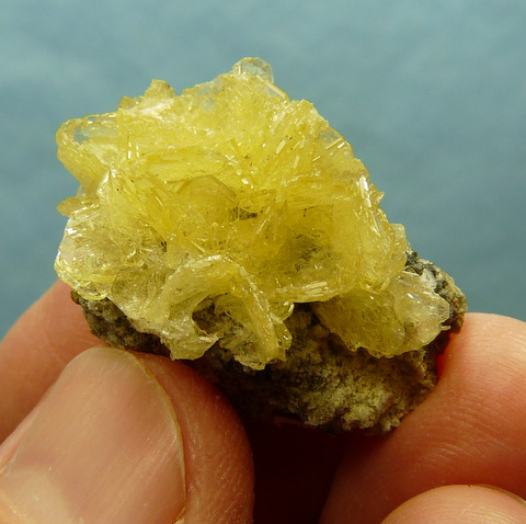 Beautiful small, light yellow barite crystals on matrix