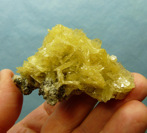 Pale clear to light yellow barite crystals on matrix