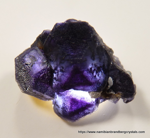 Purple fluorite crystal group with light from behind Purple fluorite crystal group with light from behind